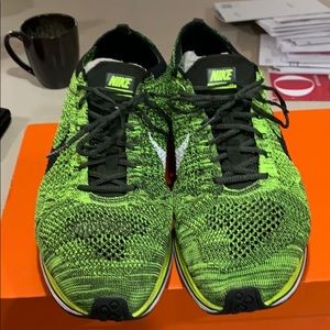 One pair of brand new Nike fly knit racers.